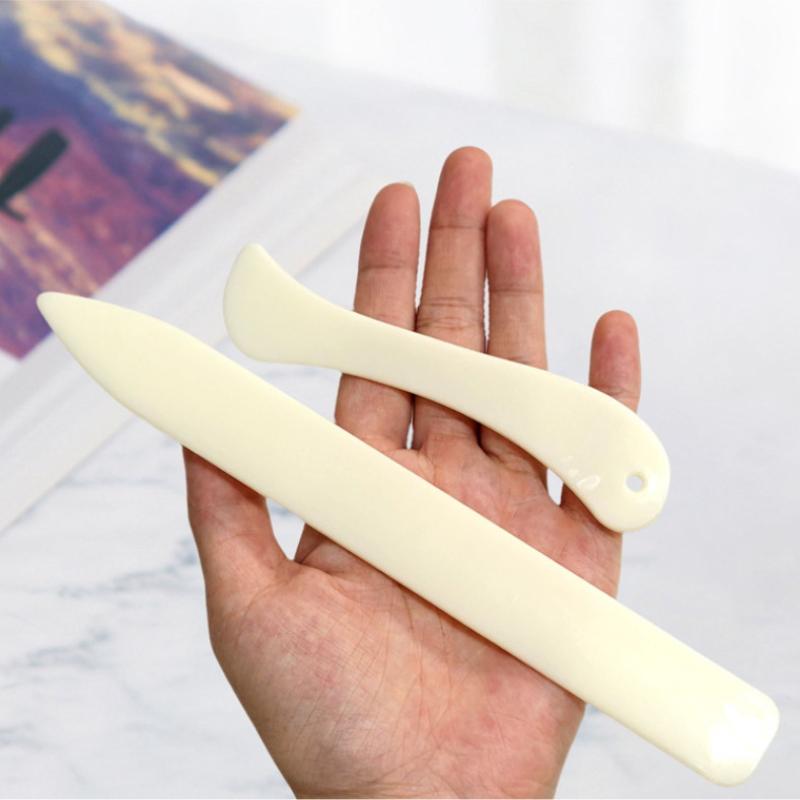 أداة طي الجلد (بون فولدر) قطعت - مراجعة Bone Folder Tool وسعره
